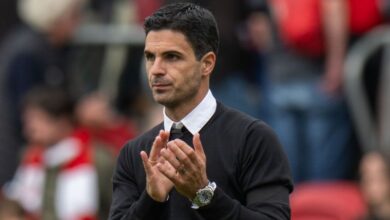 Arsenal manager Mikel Arteta applauds the fans at the final whistle during the Premier League match between Brentford FC and Arsenal FC at Brentford Community Stadium on September 18, 2022 in Brentford, United Kingdom.