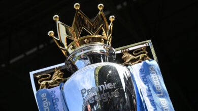 The Premier League trophy is seen on display pitch-side ahead of the English Premier League football match between Fulham and Liverpool at Craven Cottage in London on August 6, 2022.