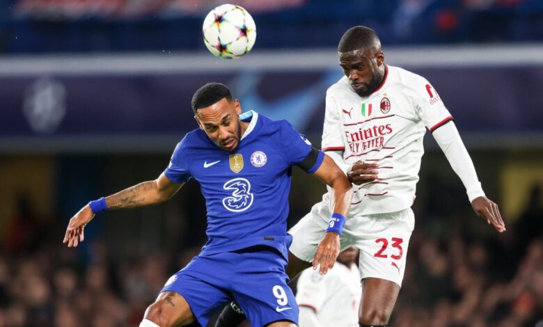 Chelsea striker Pierre-Emerick Aubameyang and AC Milan defender Fikayo Tomori challenge for a header during the UEFA Champions League match between Chelsea and AC Milan on 4 October, 2022 at Stamford Bridge, London, United Kingdom