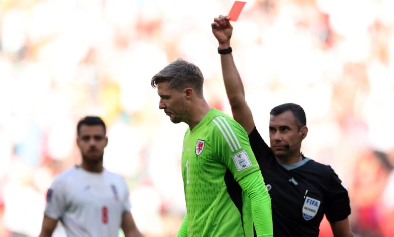 Wayne Hennessey of Wales is sent off by referee Mario Escobar during the FIFA World Cup Qatar 2022 Group B match between Wales and IR Iran at Ahmad Bin Ali Stadium on November 25, 2022 in Doha, Qatar.