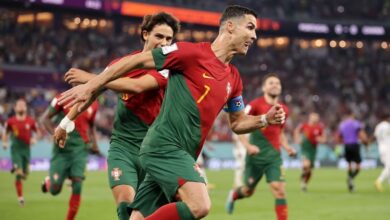 Cristiano Ronaldo celebrates after scoring a penalty for Portugal against Ghana to become the first player ever to net in five different World Cups.