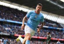 Joao Cancelo of Manchester City celebrates after scoring their 1st goal during the Premier League match between Manchester City and Southampton FC at Etihad Stadium on October 8, 2022 in Manchester, United Kingdom.