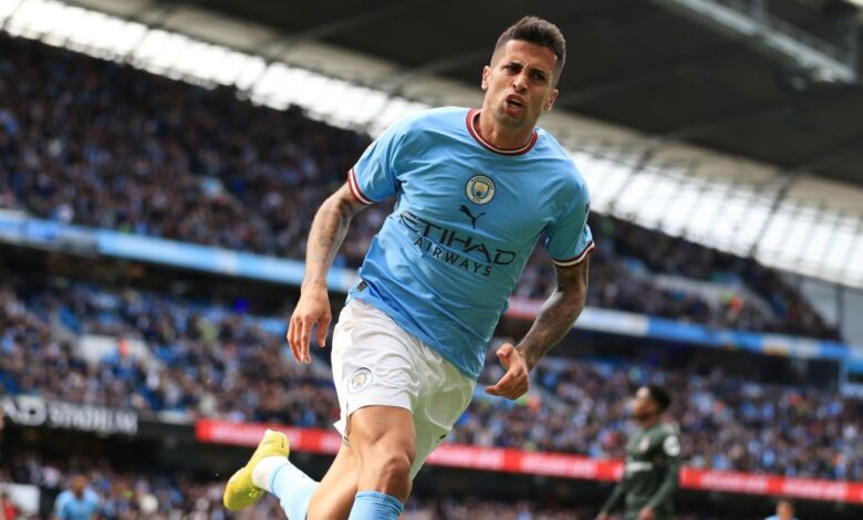 Joao Cancelo of Manchester City celebrates after scoring their 1st goal during the Premier League match between Manchester City and Southampton FC at Etihad Stadium on October 8, 2022 in Manchester, United Kingdom.