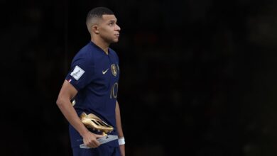 Manchester United target and PSG forward Kylian Mbappe of France poses for a photo with the adidas Golden Boot during the FIFA World Cup Qatar 2022 Final match between Argentina and France at Lusail Stadium on December 18, 2022 in Lusail City, Qatar.