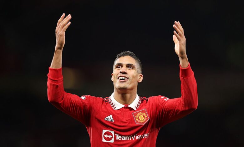 Manchester United defender Raphael Varane celebrates after their sides victory during the Premier League match between Manchester United and Tottenham Hotspur at Old Trafford on October 19, 2022 in Manchester, England