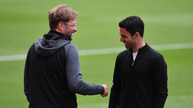 Liverpool and Arsenal managers Mikel Arteta and Jurgen Klopp share a moment before the Premier League match between Arsenal FC and Liverpool FC at Emirates Stadium on July 15, 2020 in London, England. Football Stadiums around Europe remain empty due to the Coronavirus Pandemic as Government social distancing laws prohibit fans inside venues resulting in all fixtures being played behind closed doors.