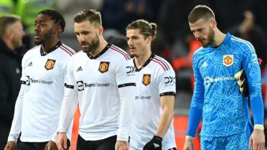 Manchester United players look dejected as they leave the field, after being defeated 7-0 during the Premier League match between Liverpool FC and Manchester United at Anfield on March 05, 2023 in Liverpool, England.