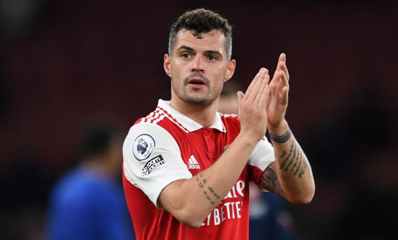 Arsenal star Granit Xhaka applauds the fans