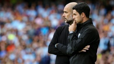 Arsenal manager Mikel Arteta and Manchester City boss Pep Guardiola look on during the Premier League match between Manchester City and Tottenham Hotspur at Etihad Stadium on August 17, 2019 in Manchester, United Kingdom.